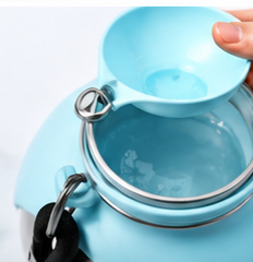 Close-up of the WagWander silicone bowl folded open, ready to pour